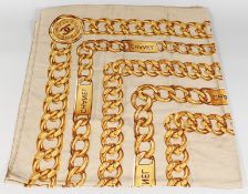 A VINTAGE CHANEL SILK SCARF, GOLD CHAIN.