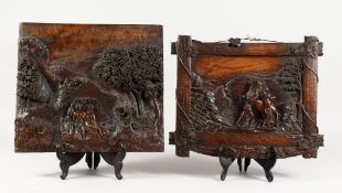 A SUPERB PAIR OF BLACK FOREST CARVED WOOD PICTURES OF ITALIAN SCENES with figures and animals. 15.