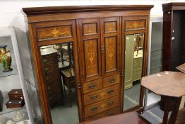 A late Victorian inlaid rosewood compactum.