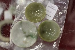 Three small Chinese jade bowls.
