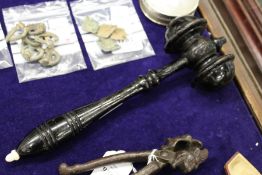 A large ebonised gavel.