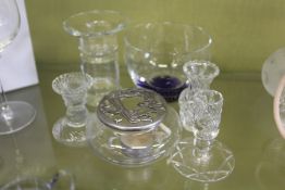 A glass bowl, candle holders etc.