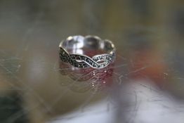 A silver and marcasite ring.