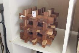A wooden puzzle (?).