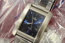 A gent's Tim stainless steel wristwatch.