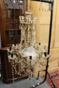 A cut glass eight branch chandelier.