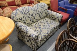 A 1930's two seater drop end settee.