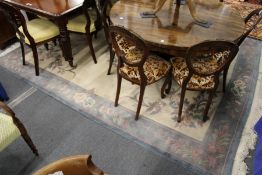 A good Chinese carpet, beige ground ground with blue central motif within a similar border.