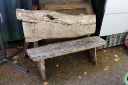 A rustic garden brench.