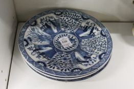 Four blue and white Chinese plates.