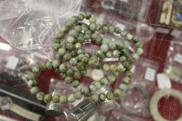 A Chinese bead necklace.