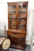 A Victorian mahogany secretaire cupboard bookcase.
