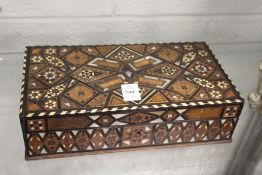 An eastern inlaid wooden box.