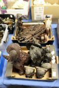 A quantity of African and other carved hardwood figures.