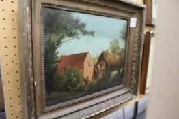 A Cottage and Farm Buildings in a Wooded Landscape oil on board.
