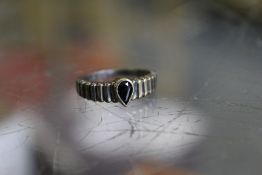 A silver ring.