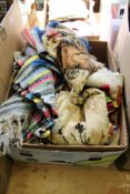 A box of various textiles.