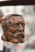 A carved wood pipe.