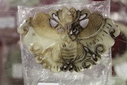 A Chinese carved jade butterfly pendant.