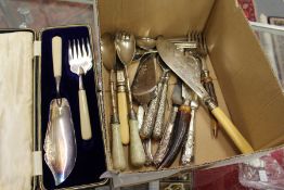A cased fish serving set and other cutlery.