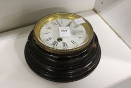 A small Victorian wall clock.