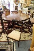 A set of four William IV rosewood dining chairs.