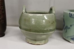 A Chinese sang style celadon porcelain candlestick holder.
