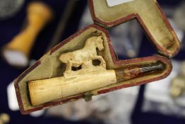 A small Meerschaum pipe, cased.