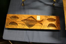 A carved wood shortbread mould.