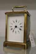 An Asprey's brass carriage clock.