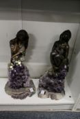 An unusual pair of amethyst and bronze colour female figure groups.