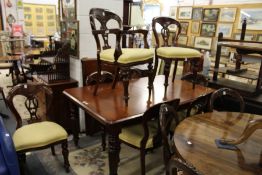 A set of eight Victorian style mahogany dining chairs one with arms.