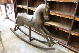 A large eastern style rocking horse.