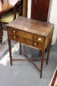 A 19th century mahogany two drawer work table.