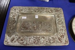 An embossed metal plaque.