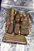 Four unusual carved items.