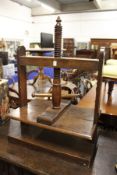 A 19th century oak table top clothes press.