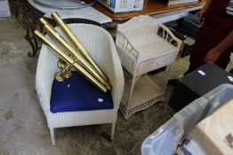 A Lloyd Loom chair and similar bedside table.
