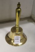 A brass bell.