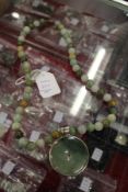 A Chinese jadeite necklace.