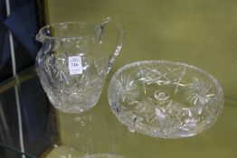 A cut glass jug and similar bowl.
