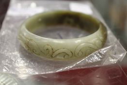 A Chinese jade bangle.