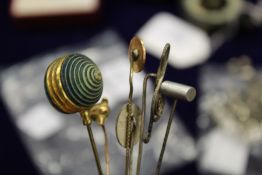 Various stick pins.