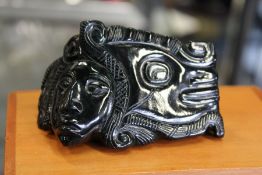 An unusual carved jadeite figure group in original box.
