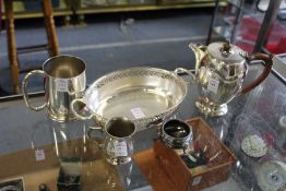 A plated tankard and other items.