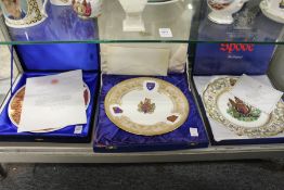 Three collector's plates, boxed.