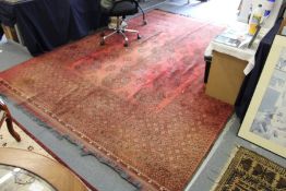 A good large red ground Bokhara style carpet.