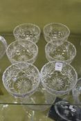 A set of six cut glass bowls.
