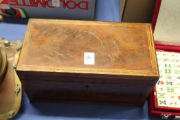 A Georgian mahogany tea caddy.