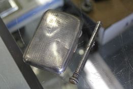 A small engraved silver cigarette case and silver propelling pencil.